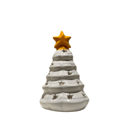 white ceramic candle holder shaped as a Christmas tree with a yellow star on the top